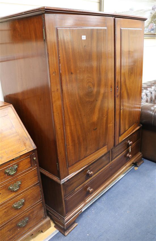 A George III mahogany linen press cupboard, lacking trays, W.125cm